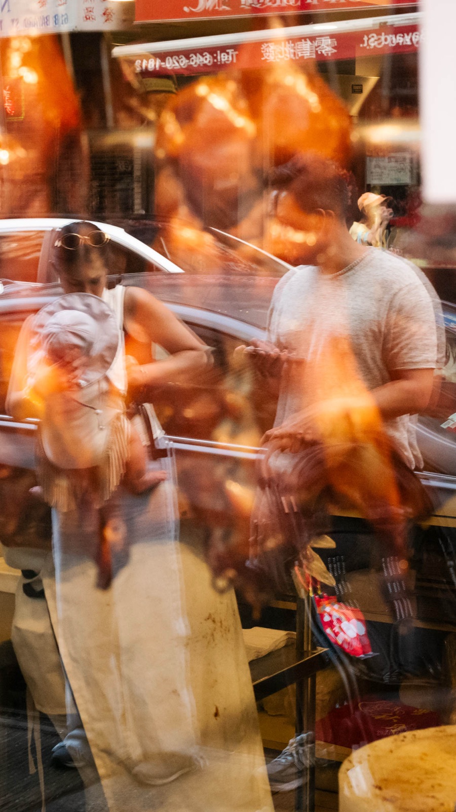 Reflection in a shop window in Chinatown